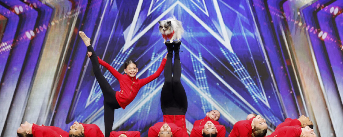 The Acro Crew performs onstage with a dog in America's Got Talent Season 21 Episode 1.